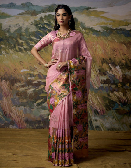 Luxury baby pink handwoven Kota tissue saree with a 14.5-inch broad multicolour floral border, butterflies and birds, silver and gold zari booti, gold zari zig-zag pallu and designer festive elegance by Sonchiraiya