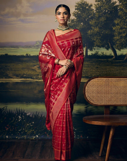 Luxury red handwoven Kota saree with gold zari geometric check weave, silver zari booti, Banarasi Guldasta floral vase pallu, heritage woven border and premium festive wedding designer craftsmanship by Sonchiraiya